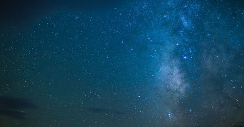 Low angle view of stars in sky at night