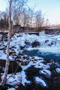 Stream flowing through rocks