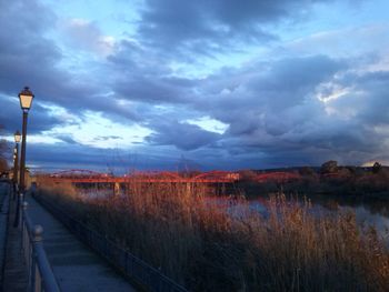 View of road against cloudy sky