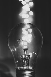 Close-up of illuminated light bulb