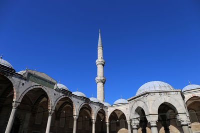 Low angle view of cathedral against clear blue sky