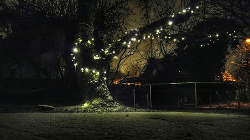 Illuminated street light at night