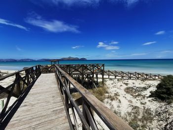 Scenic view of sea against blue sky