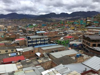 Aerial angle view of townscape in mountains.