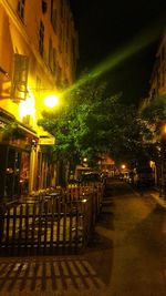 Illuminated street lights at night