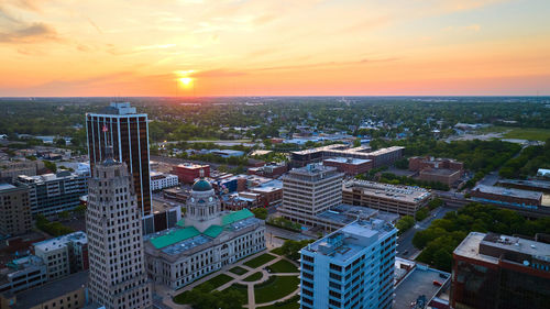 High angle view of townscape against sky during sunset