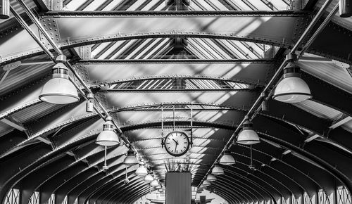 Low angle view of illuminated ceiling at railroad station