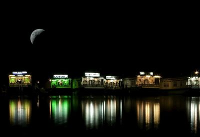 Reflection of illuminated buildings in water