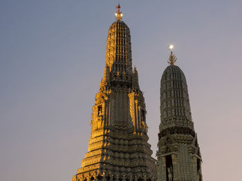 Low angle view of statue of temple against sky