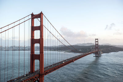 Golden gate bridge over bay against sky