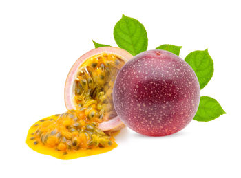 Close-up of fruits against white background