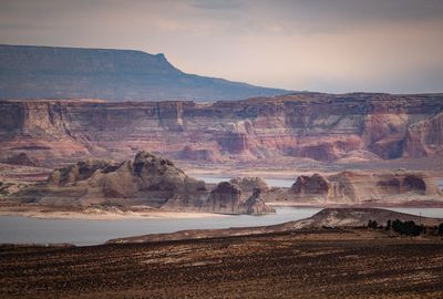 Scenic view of landscape and mountains against sky