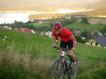 Woman riding bicycle in park