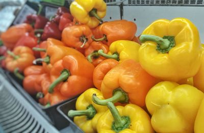 High angle view of bell peppers for sale in market