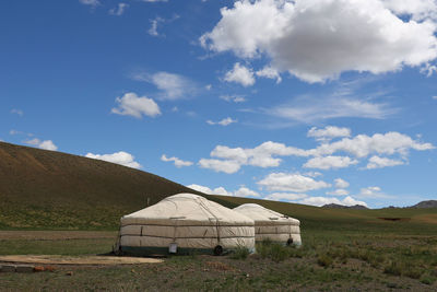 Scenic view of field against sky