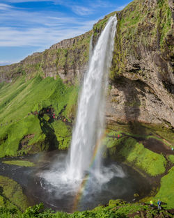 The imposing seljalandfoss waterfalls of iceland are spectacular in summertime