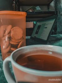 Close-up of coffee cup on table