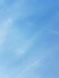 Low angle view of vapor trail in sky