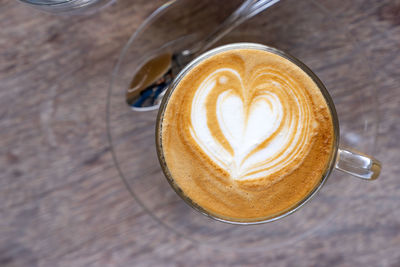 High angle view of cappuccino on table
