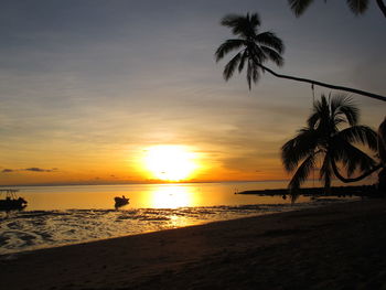 Scenic view of sea at sunset