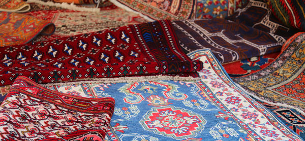 High angle view of multi colored art on carpet