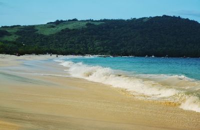 Scenic view of beach against sky