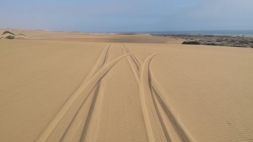 Scenic view of desert against sky