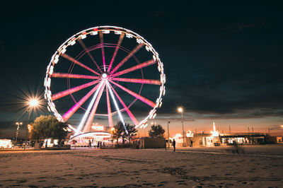 View of the ferris wheel of rimini with all the colored lights