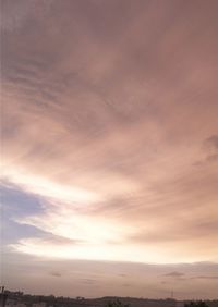Low angle view of dramatic sky during sunset
