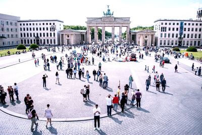 High angle view of people against brandenburg gate on sunny day