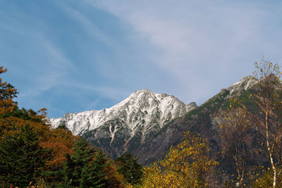 Scenic view of mountain against sky during autumn