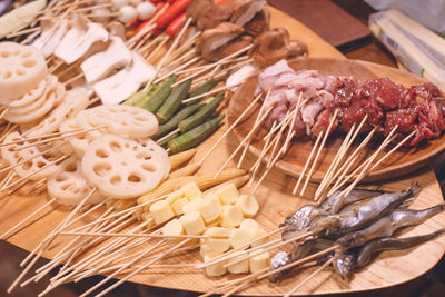 A plate with many ingredients for a skewering kushi-age party.