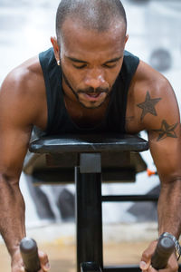 Mid adult man looking at camera