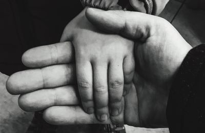 Close-up of couple hands