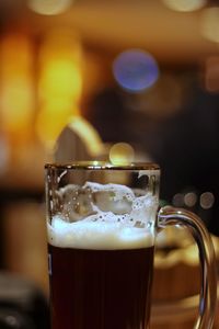 Close-up of beer on table