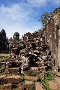 Low angle view of old ruins against sky