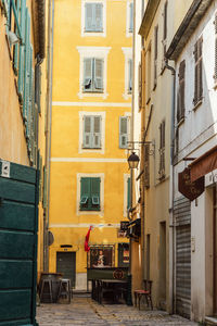 Residential buildings by street in city