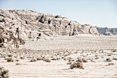 Rock formations in desert against sky