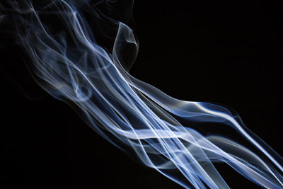 Close-up of smoke against black background