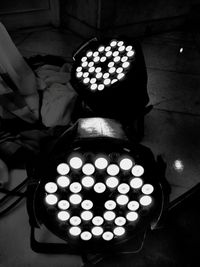 Close-up of illuminated lighting equipment