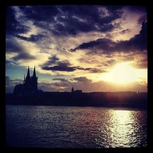 Scenic view of river at sunset