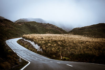 Foggy mountain road