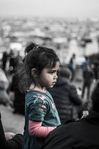 Side view of girl looking away