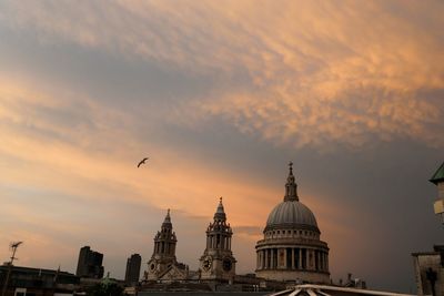 View of buildings against sky during sunset