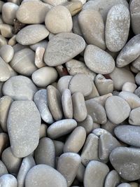 Full frame shot of pebbles on beach