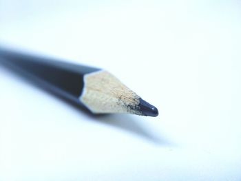 High angle view of pencils on white background