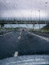 Road seen through car windshield