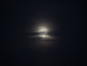 Low angle view of moon in sky at night