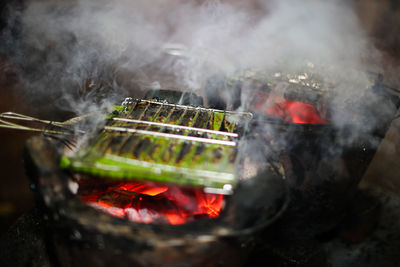 Close-up of food on barbecue grill