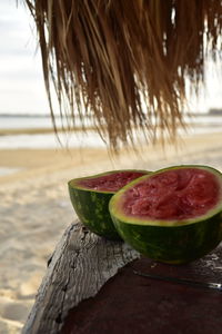 Close-up of fruit on beach